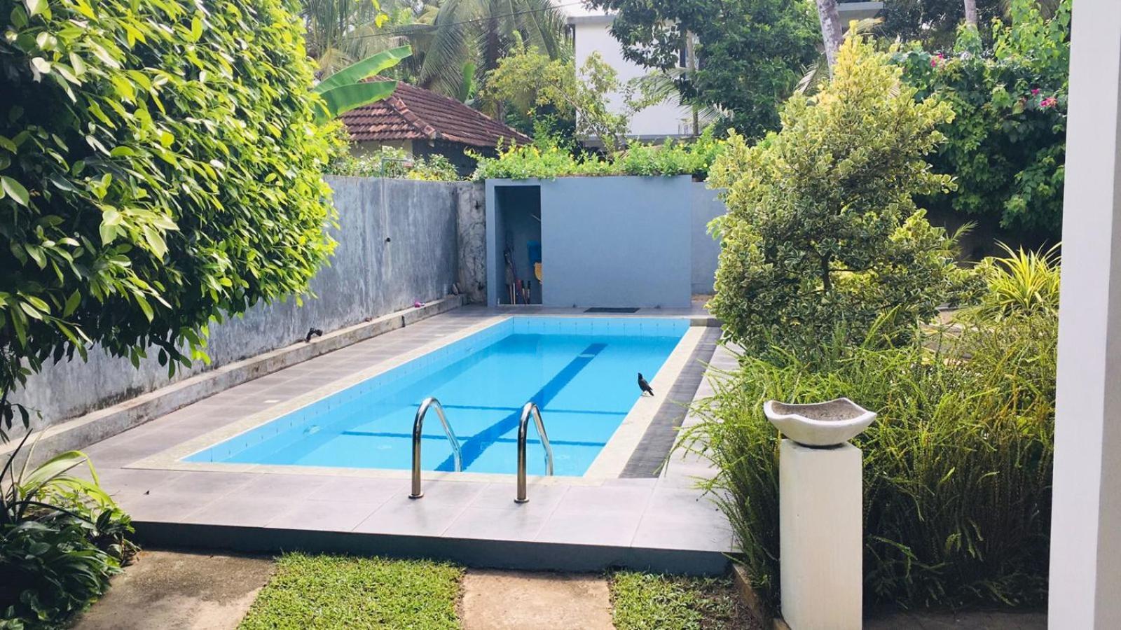 Om Villa Hikkaduwa Extérieur photo