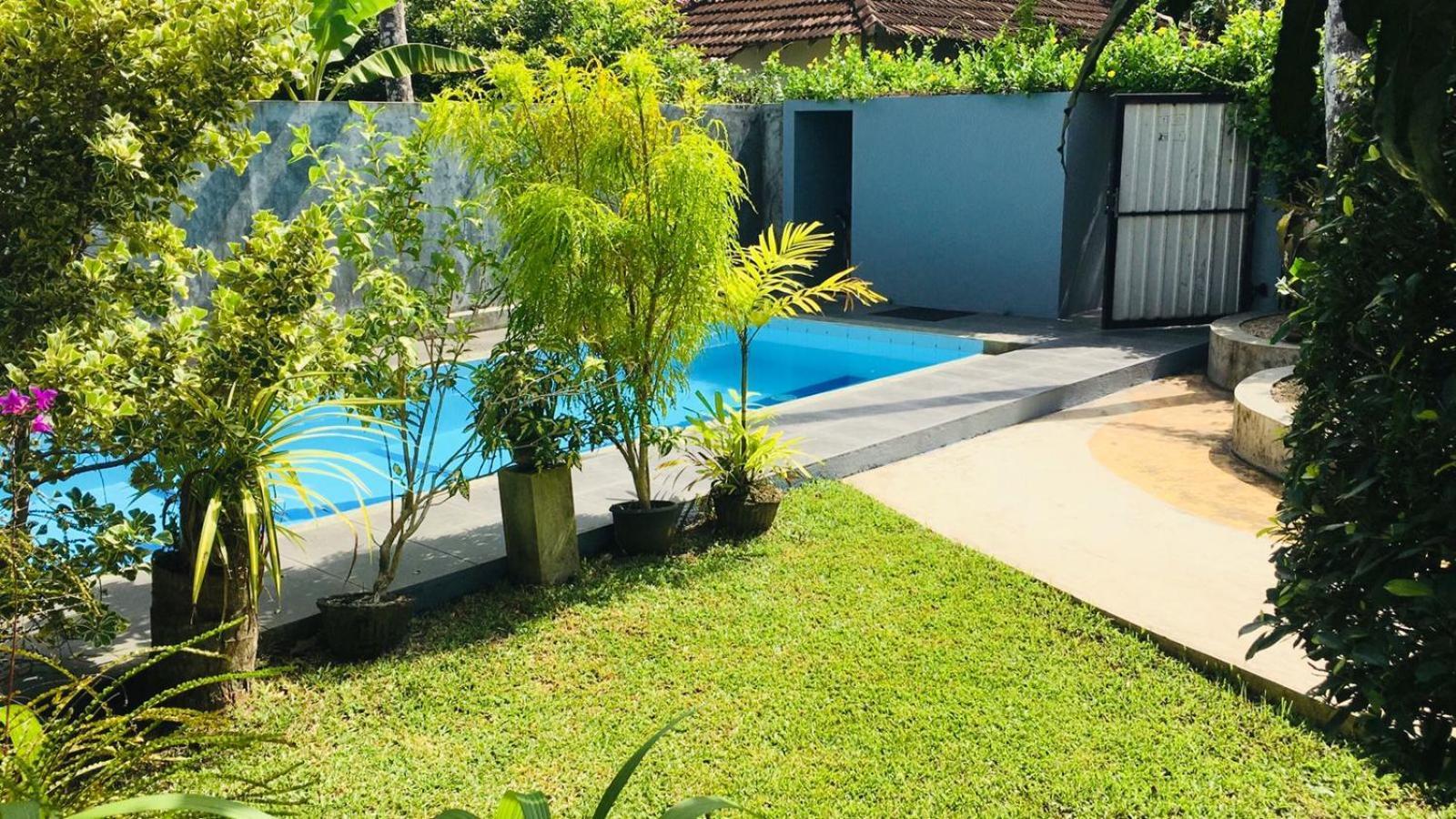 Om Villa Hikkaduwa Extérieur photo