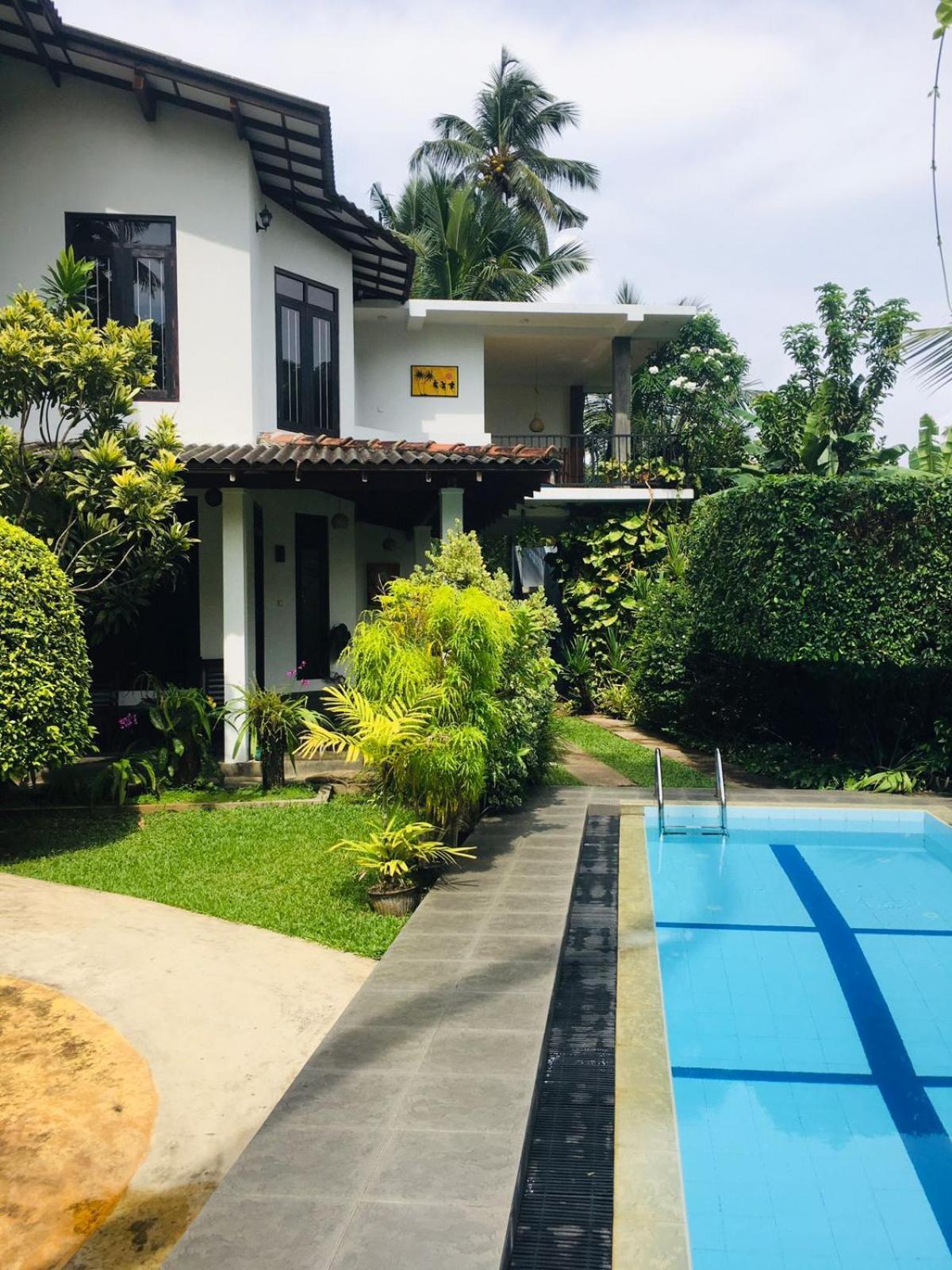 Om Villa Hikkaduwa Extérieur photo