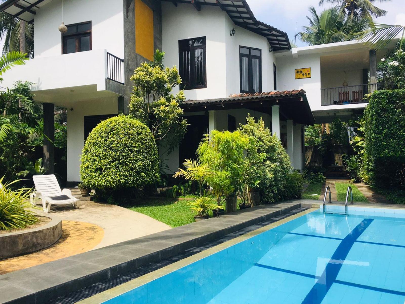 Om Villa Hikkaduwa Extérieur photo